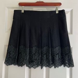 Burberry black wool and lace skirt. Like new.